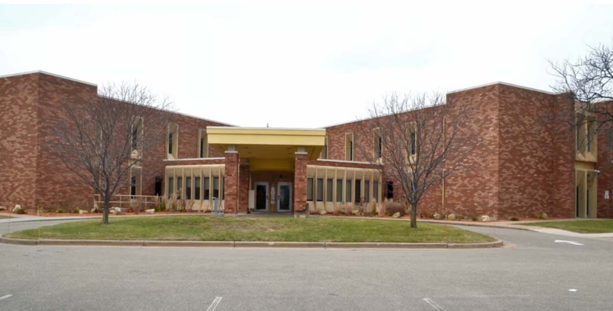 A red bricked building houses the Dunn County Government offices.