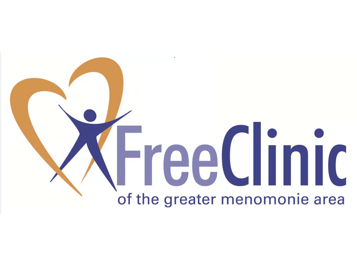 Free clinic of the Menomonie area logo. A heart with a graphically designed person in front of type.