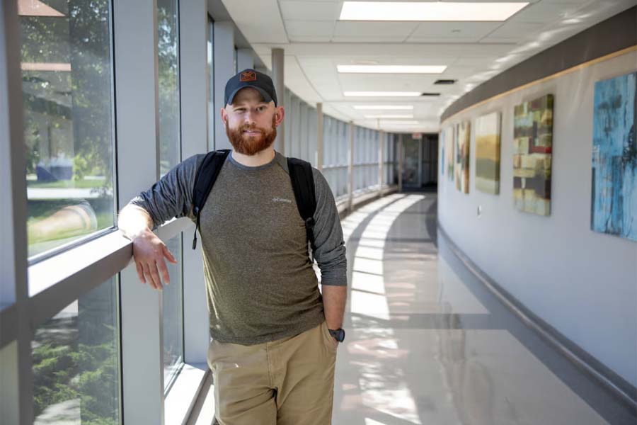 Man standing in a hallway