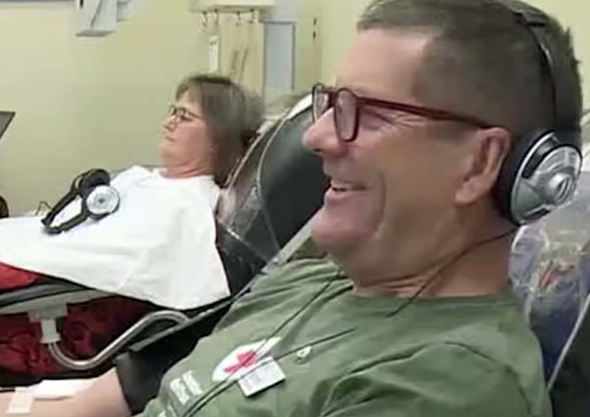 A man and a woman donate blood