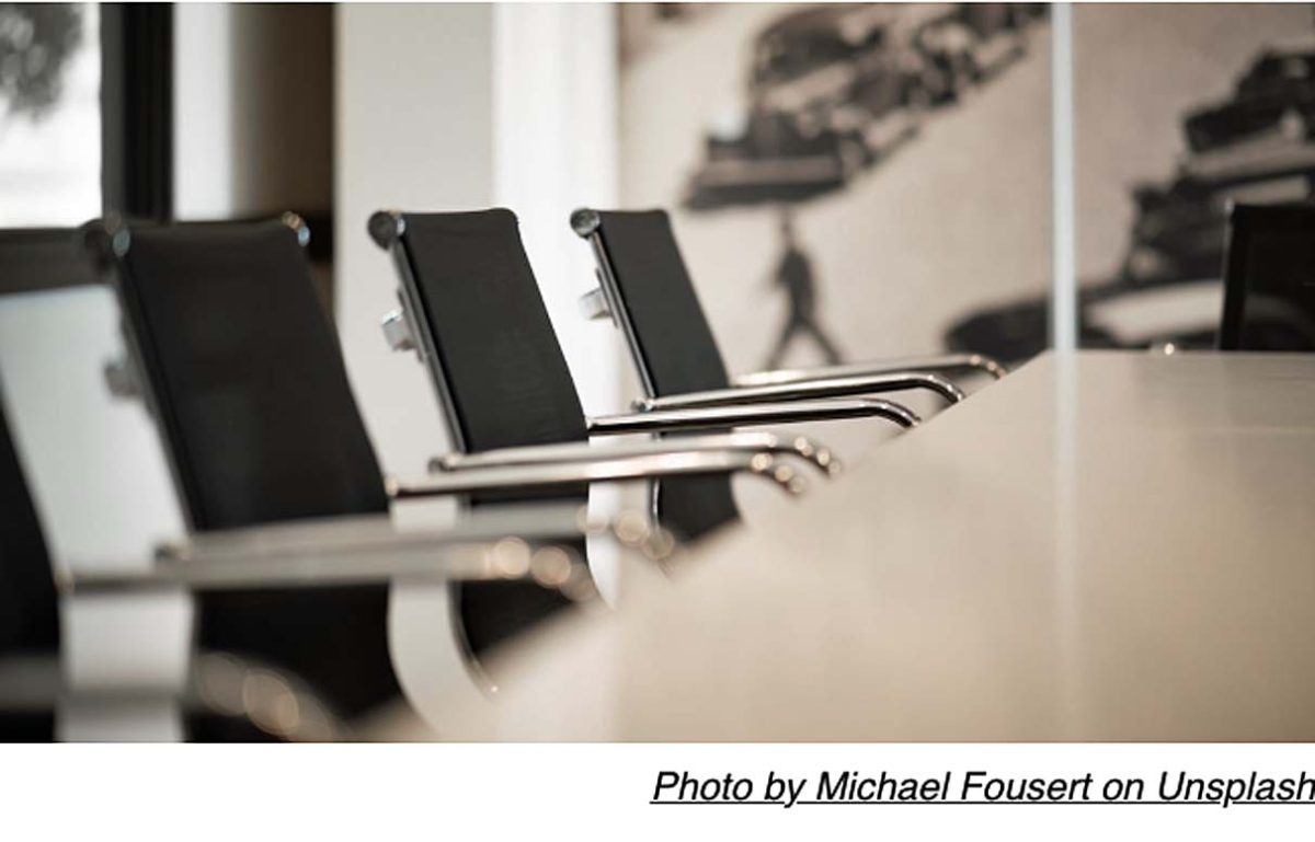 Chairs in front of a meeting table