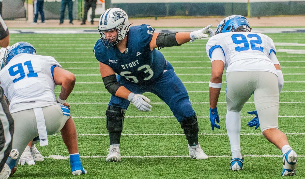 UW-Stout offensive lineman Ben Bystol points before a play.