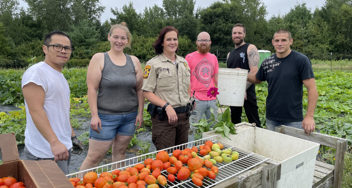 Several of the Jail Garden participants (not named in order): Katie Wolf, Denny Lee, Steve Lee, Riley Melemore and Heather Pyka, Jail Program Director. Photo: Sue Foxwell