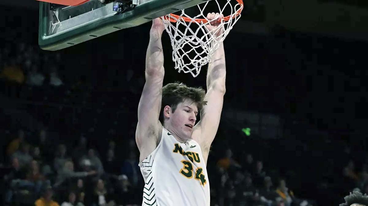 Noah Fedderson records a slam dunk.