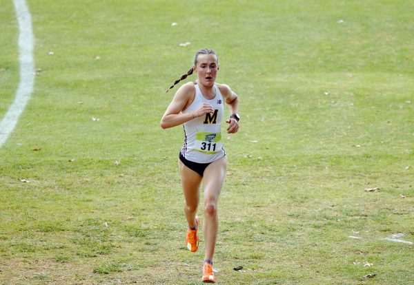Menomonie's Lauren McCalla has no one around her heading down the stretch of the race.