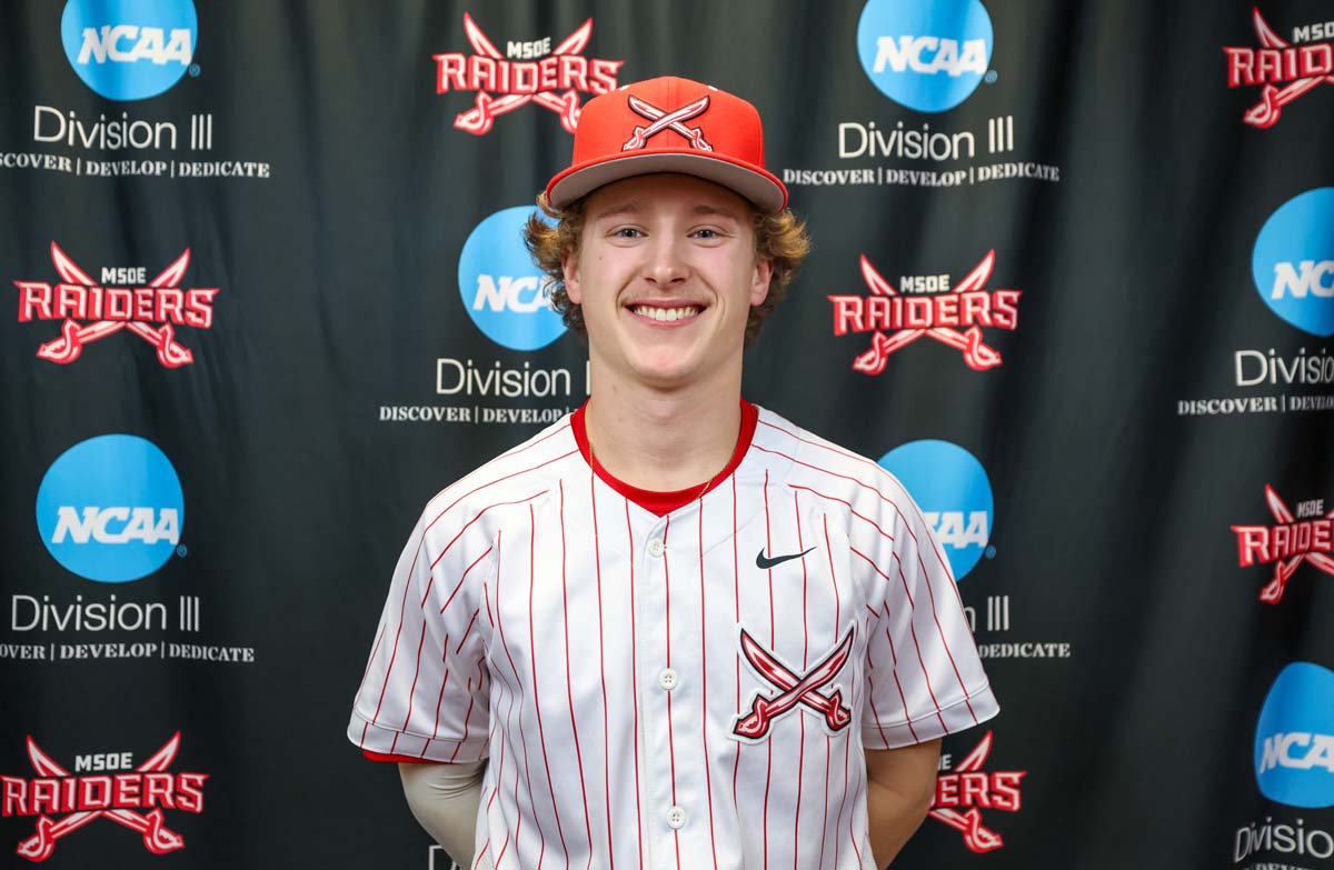 A baseball player, Owen Welch, stands in front an MSOE and NCAA Division III backdrop