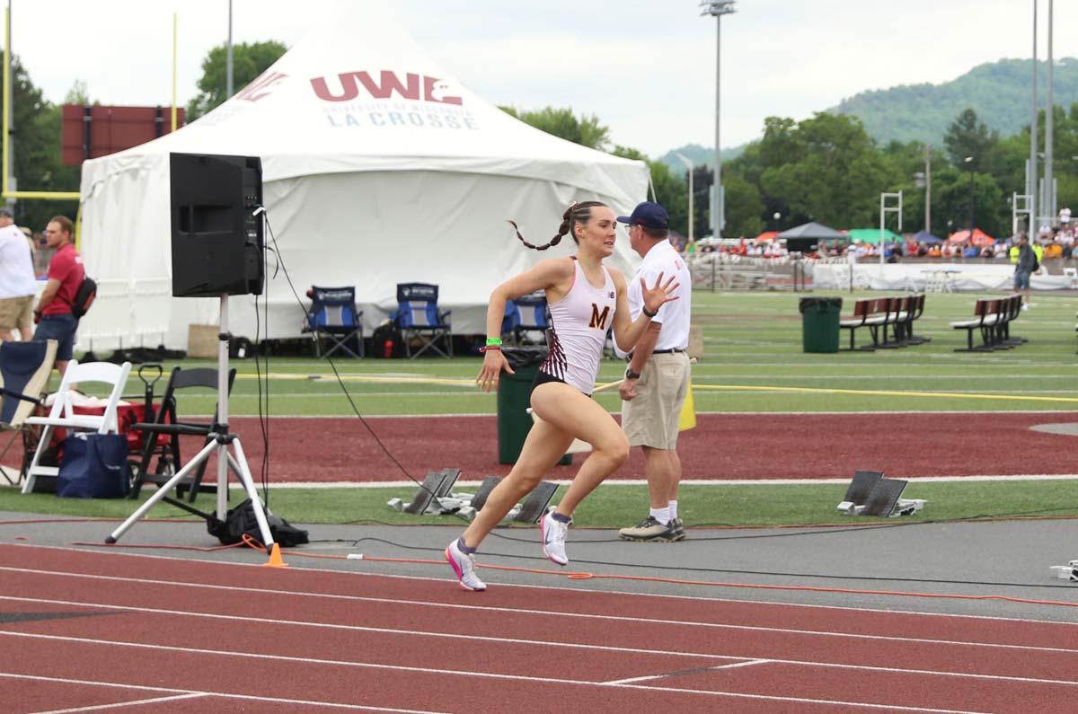 Menomonie's Lauren McCalla runs on the track at the state meet in La Crosse.