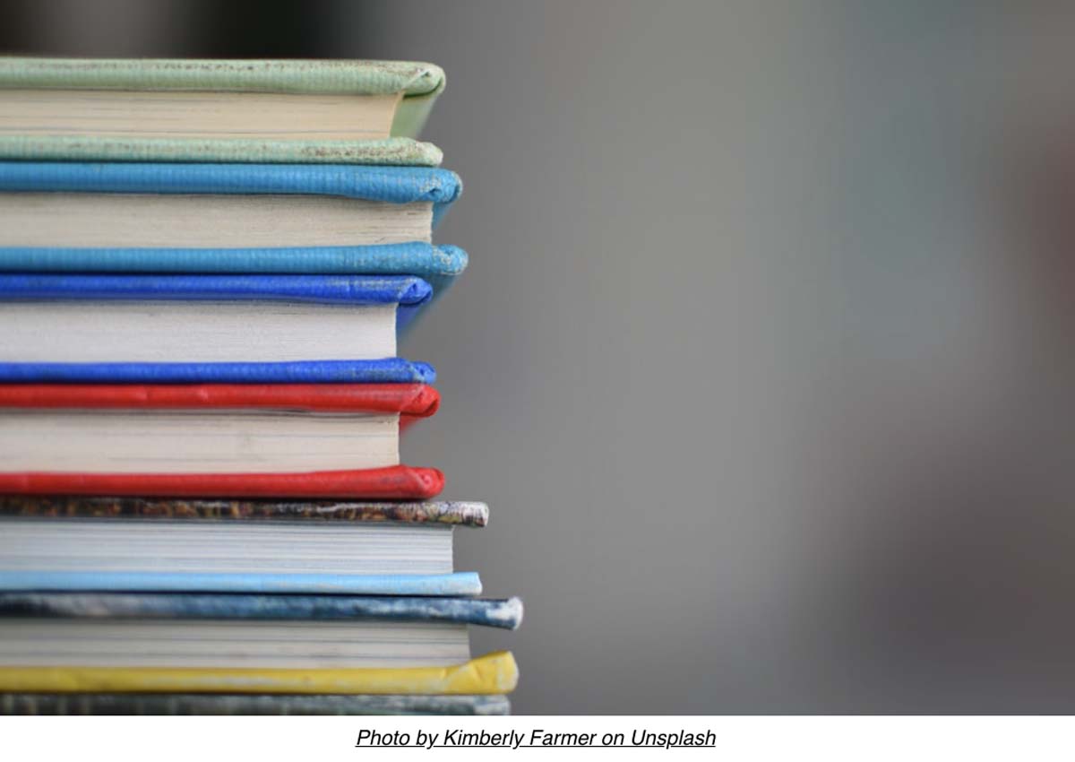 a pile of textbooks