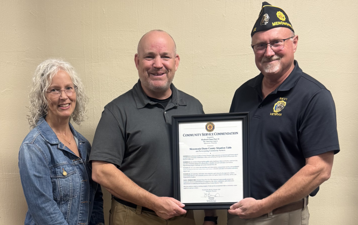 Presentation of a Community Service Commendation to Menomonie/Dunn Situation Table partners by American Legion Post 32. L to R: Sandra Frigo, Pretrial Service Coordinator, Dunn County Criminal Justice Collaboration Division; Aaron Bergh, Menomonie Police Dept Project HOPE Manager; and Jon Brutlag, Commander of Hosford-Chase Legion Post 32. Photo: submitted.