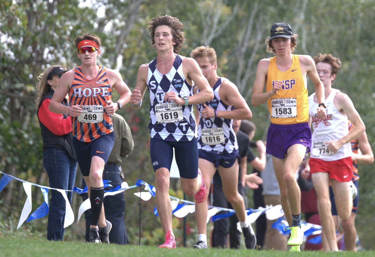 Male cross country runners at Carleton College Running of the Cows meet